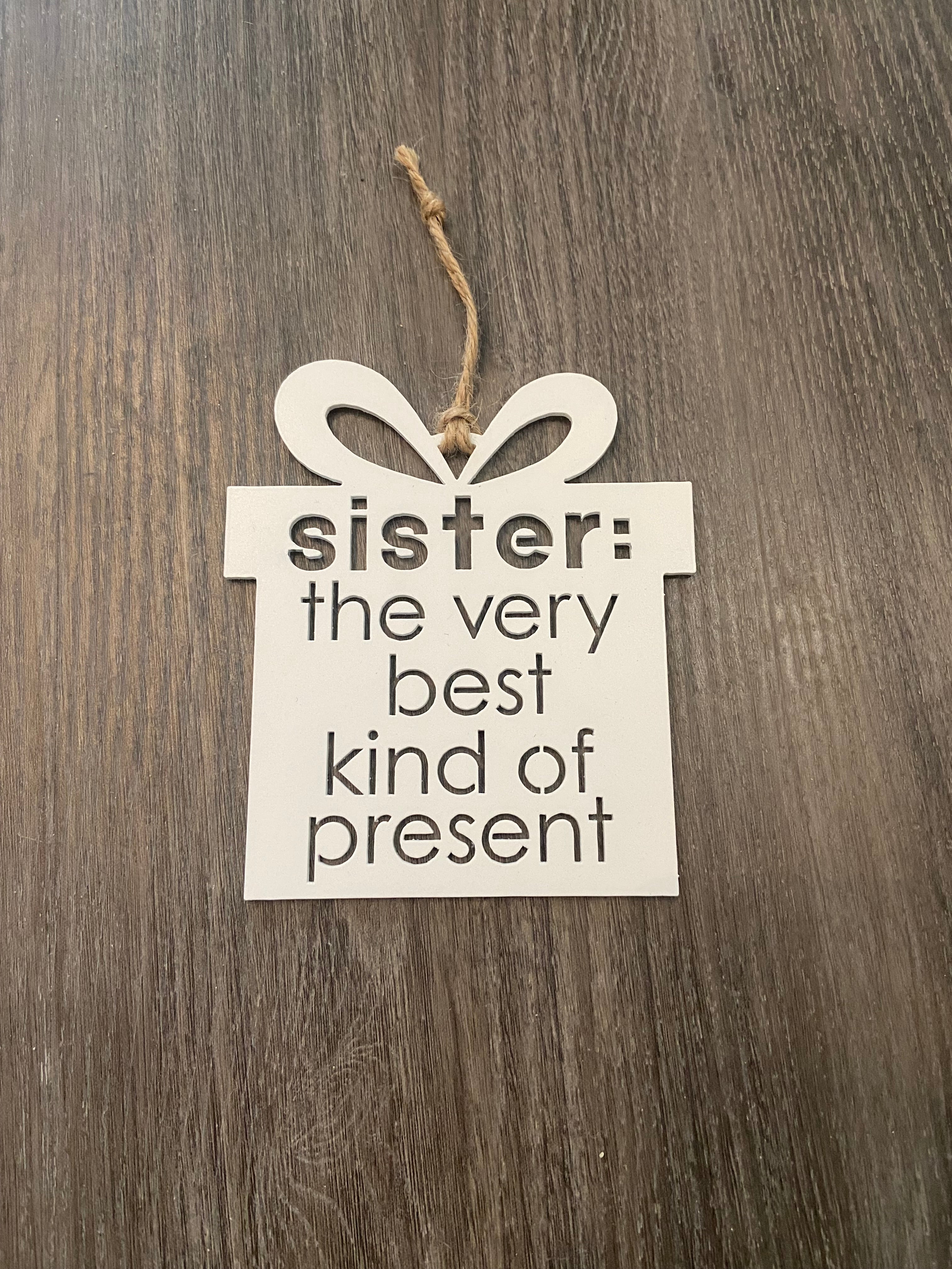 Sister: the very best kind of present Ornament